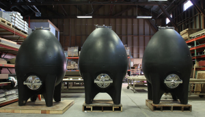Sonoma Cast Stone fermenation tanks in a deep dark hue - Sonoma Cast Stone, a growing legend in concrete fermentation tank science, and much more!